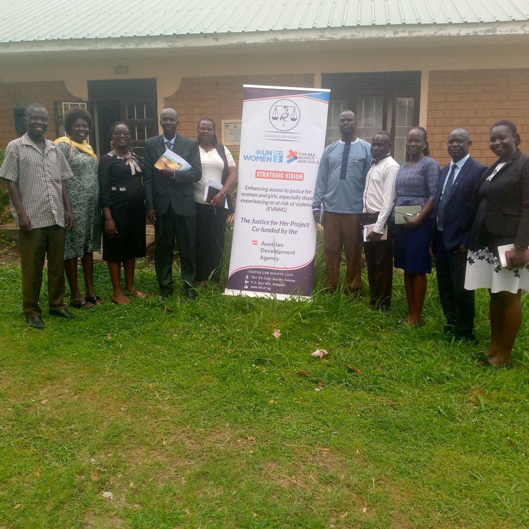 District stakeholders pose for a group photo after the Legal Aid inception meeting.